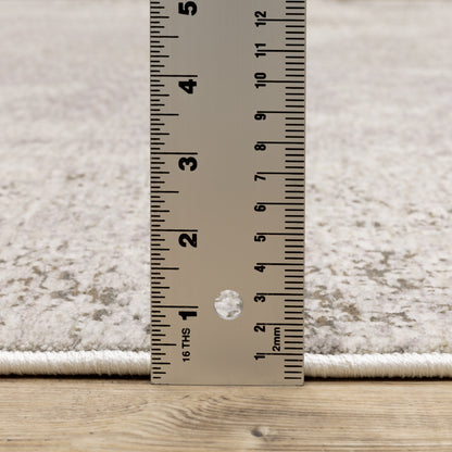 Nebulous Distressed Ivory/ Beige Abstract Cut Pile Rug