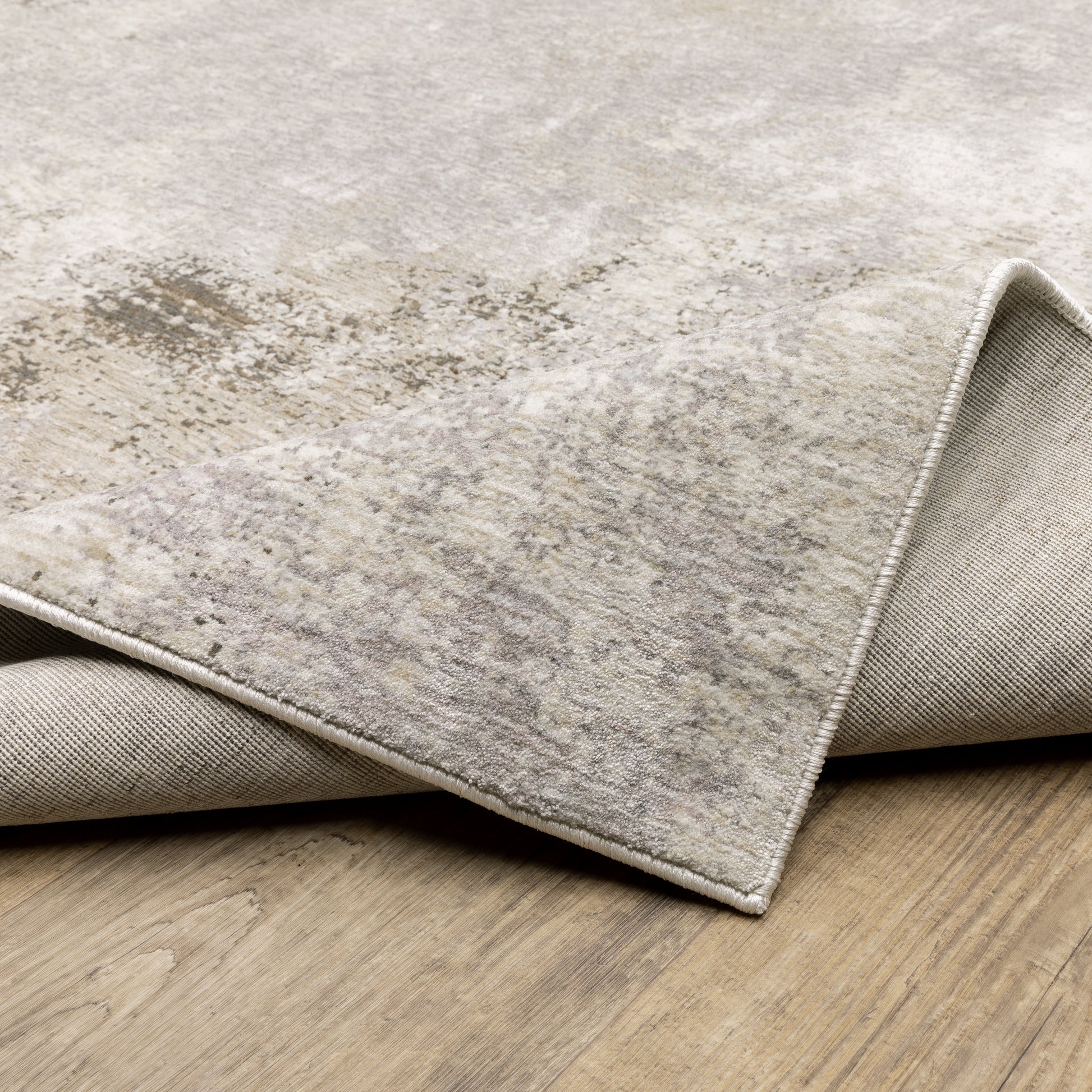 Nebulous Distressed Ivory/ Beige Abstract Cut Pile Rug