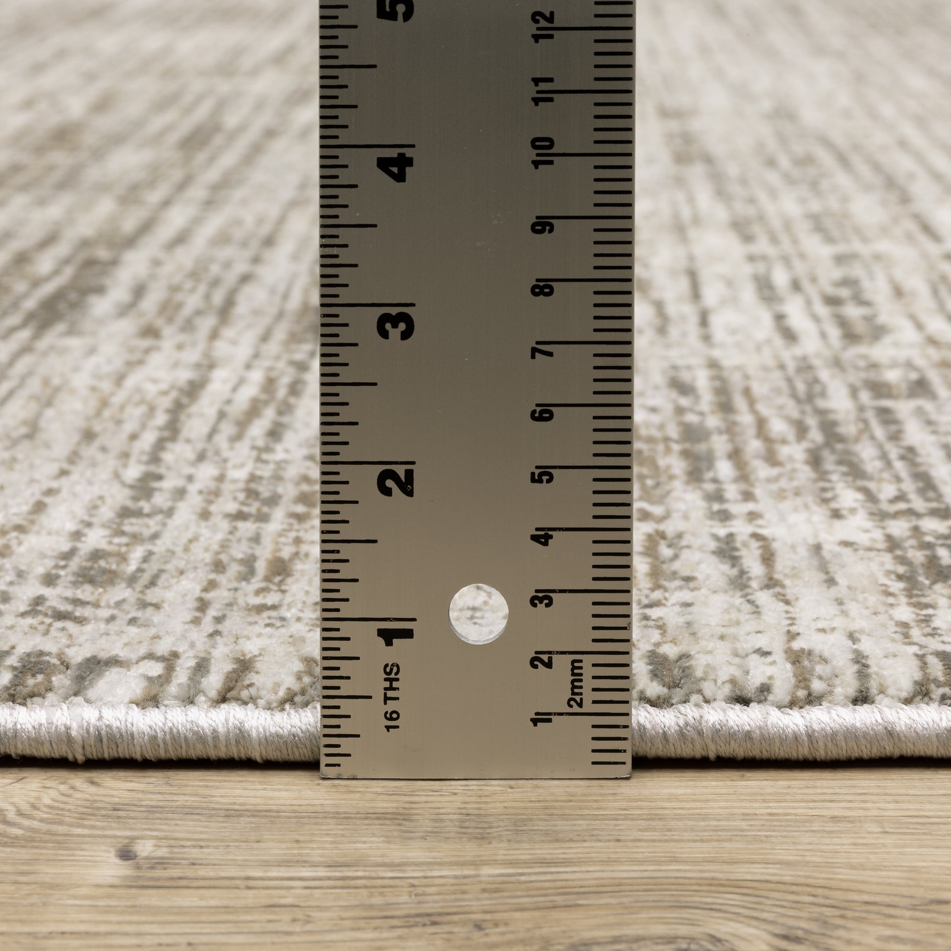 Nebulous Distressed Beige/ Ivory Abstract Cut Pile Rug