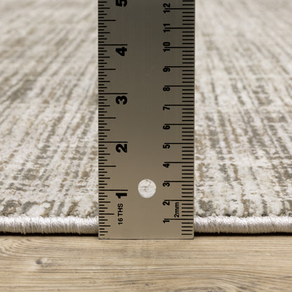 Nebulous Distressed Beige/ Ivory Abstract Cut Pile Rug