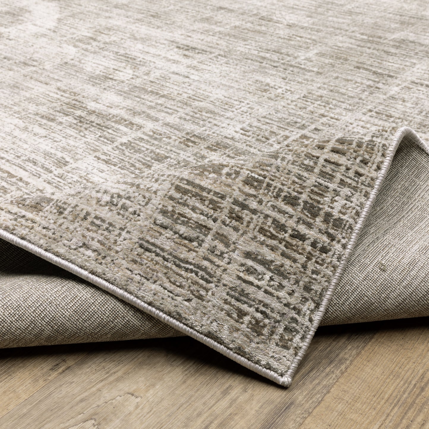 Nebulous Distressed Beige/ Ivory Abstract Cut Pile Rug
