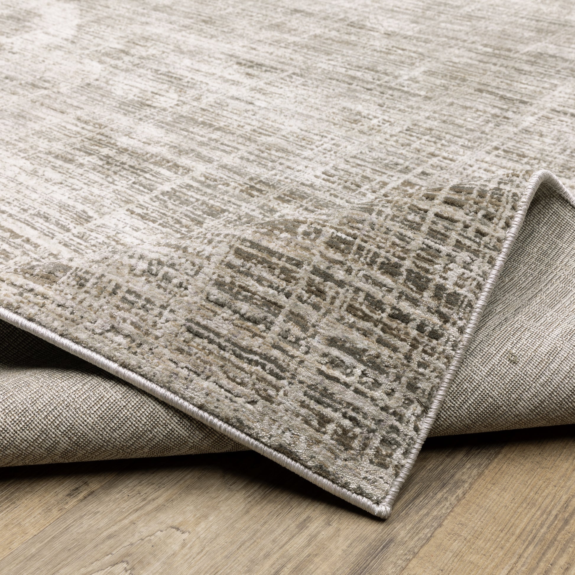 Nebulous Distressed Beige/ Ivory Abstract Cut Pile Rug