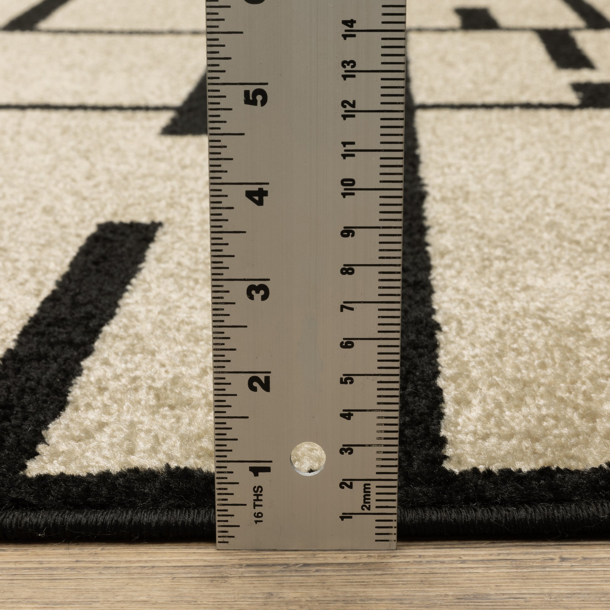 Quinn Geometric Beige/ Black Abstract Cut Pile Rug