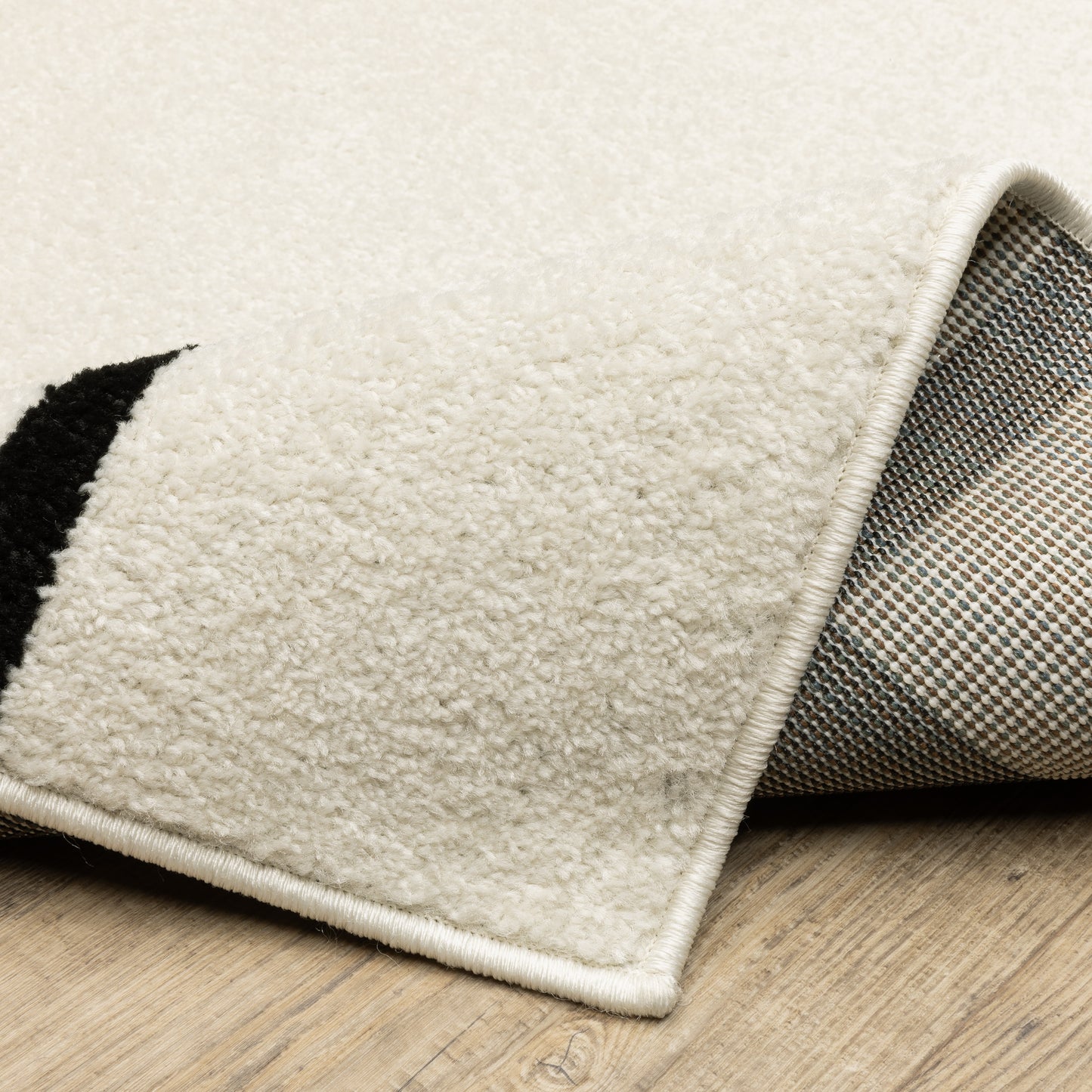 Quinn Circles Ivory/ Black Abstract Cut Pile Rug