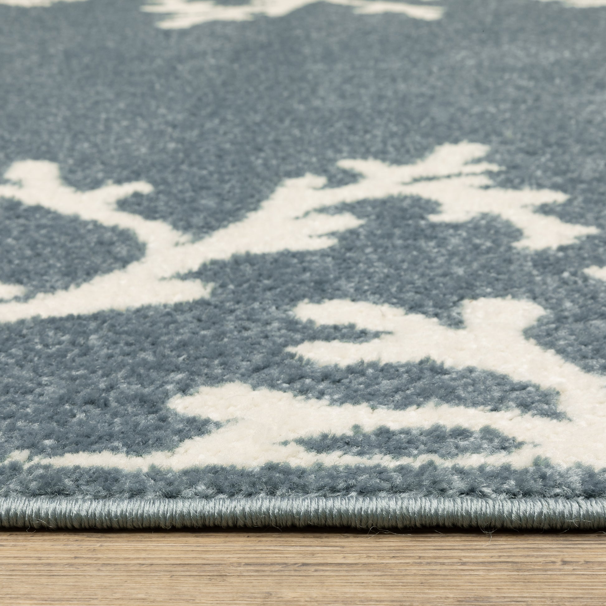 Quinn Novelty Blue/ Ivory Border Cut Pile Rug
