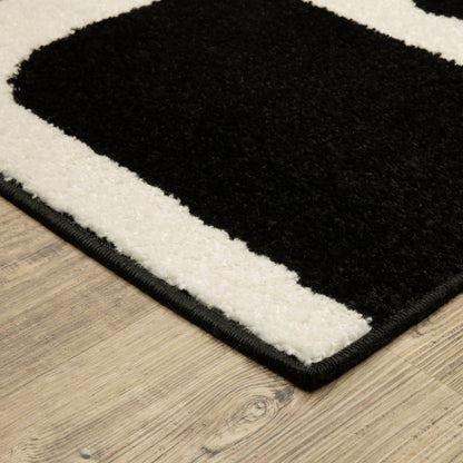 Quinn Abstract Black/ Ivory Cut Pile Rug