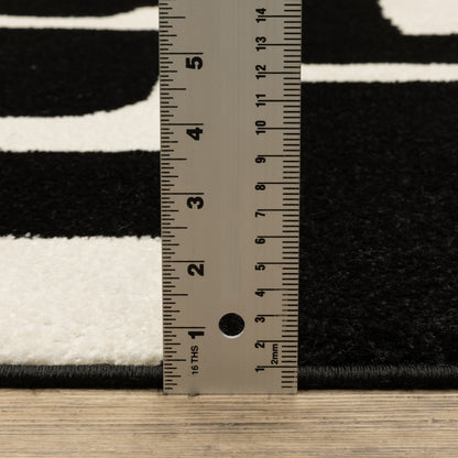 Quinn Abstract Black/ Ivory Cut Pile Rug