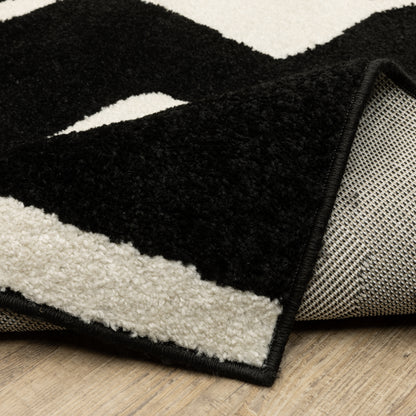 Quinn Abstract Black/ Ivory Cut Pile Rug