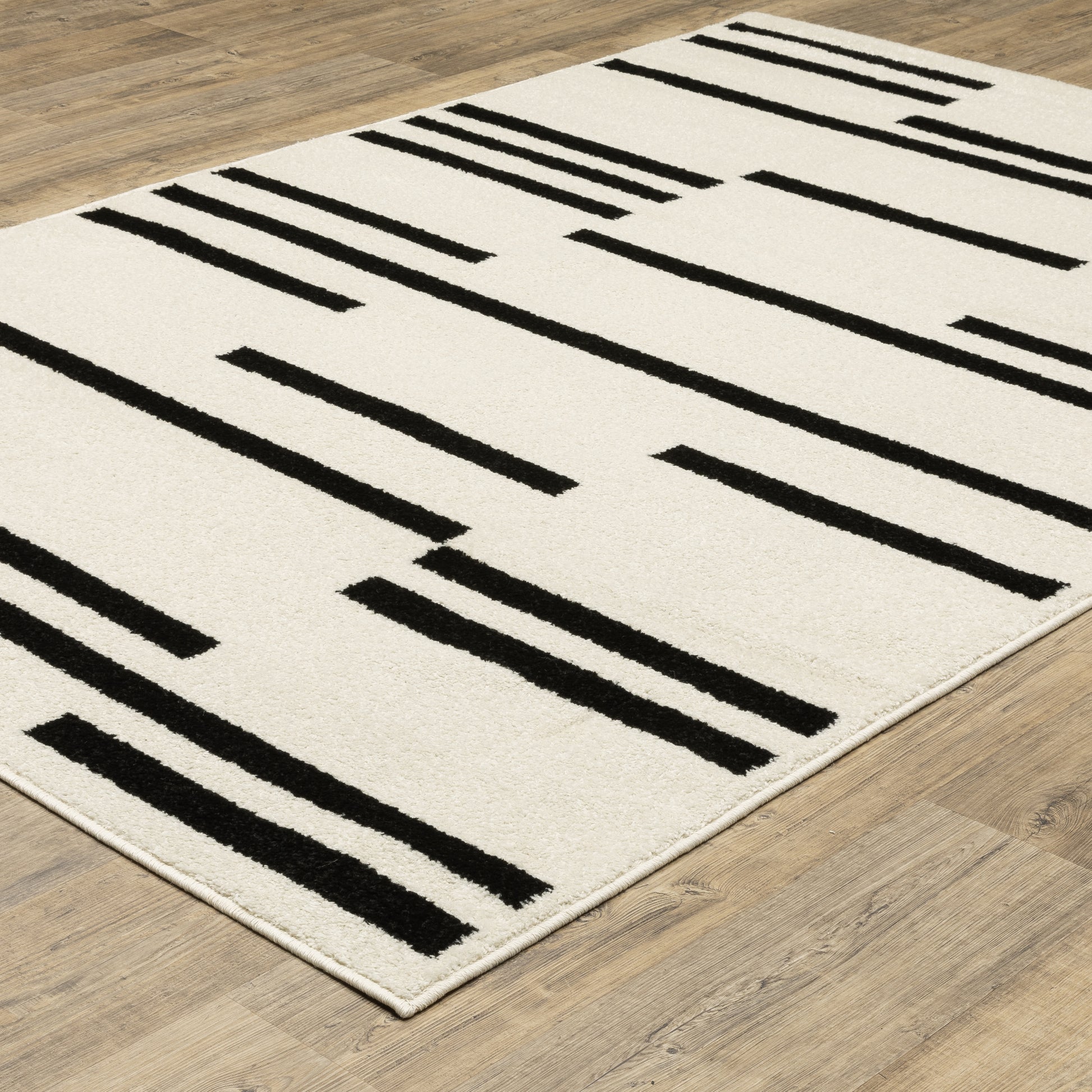 Quinn Stripe Beige/ Black Geometric Cut Pile Rug