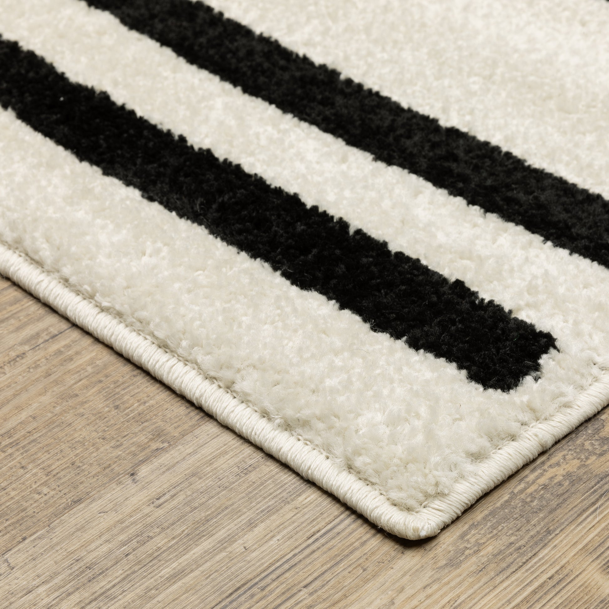 Quinn Stripe Beige/ Black Geometric Cut Pile Rug