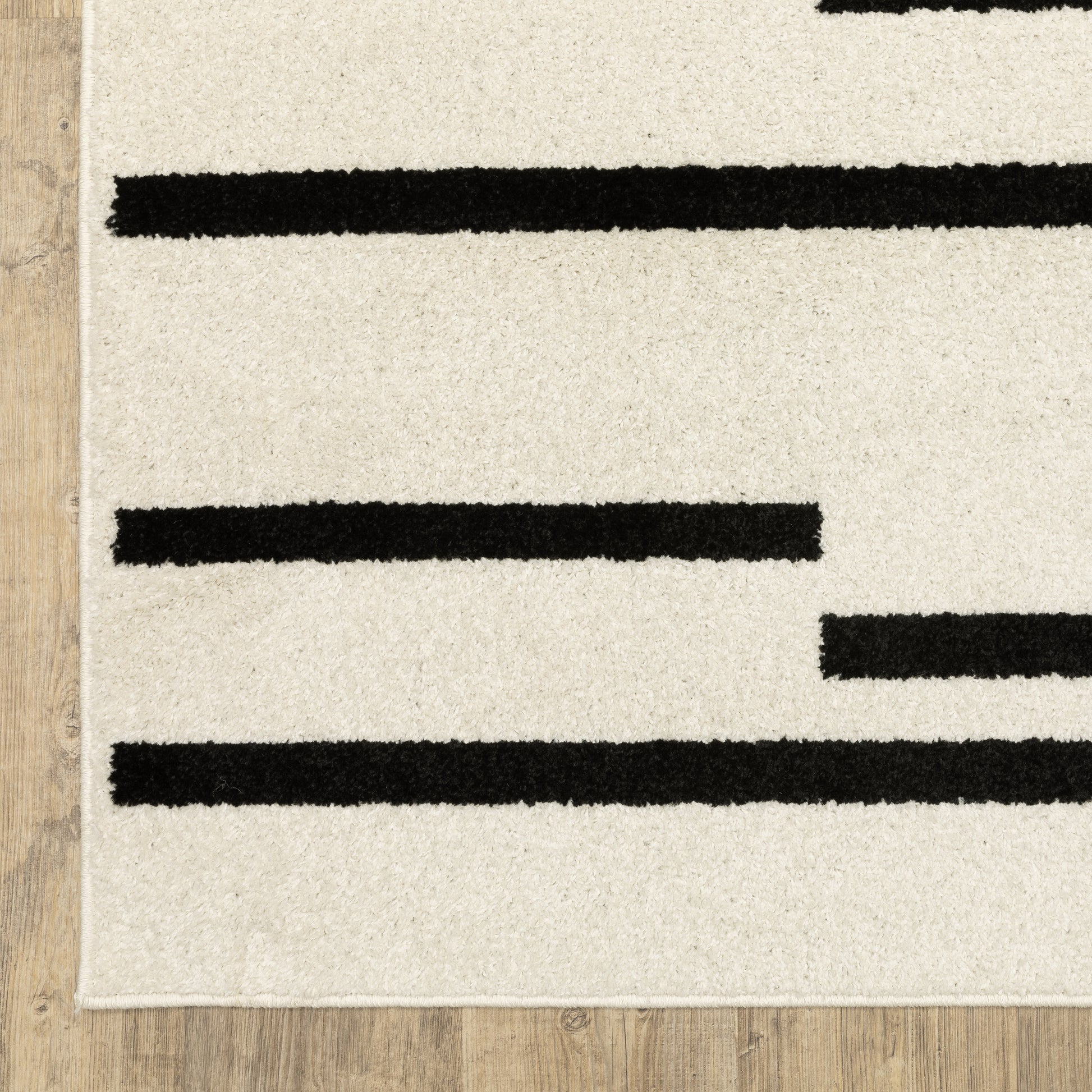 Quinn Stripe Beige/ Black Geometric Cut Pile Rug