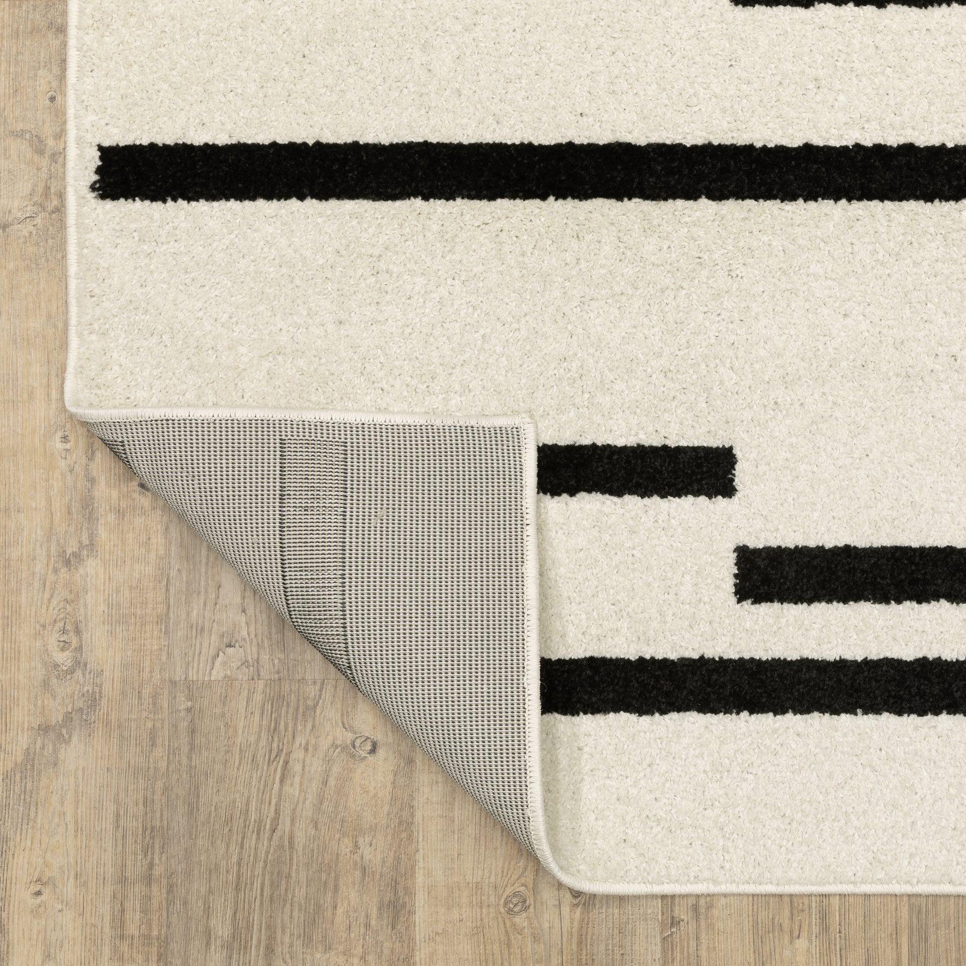 Quinn Stripe Beige/ Black Geometric Cut Pile Rug