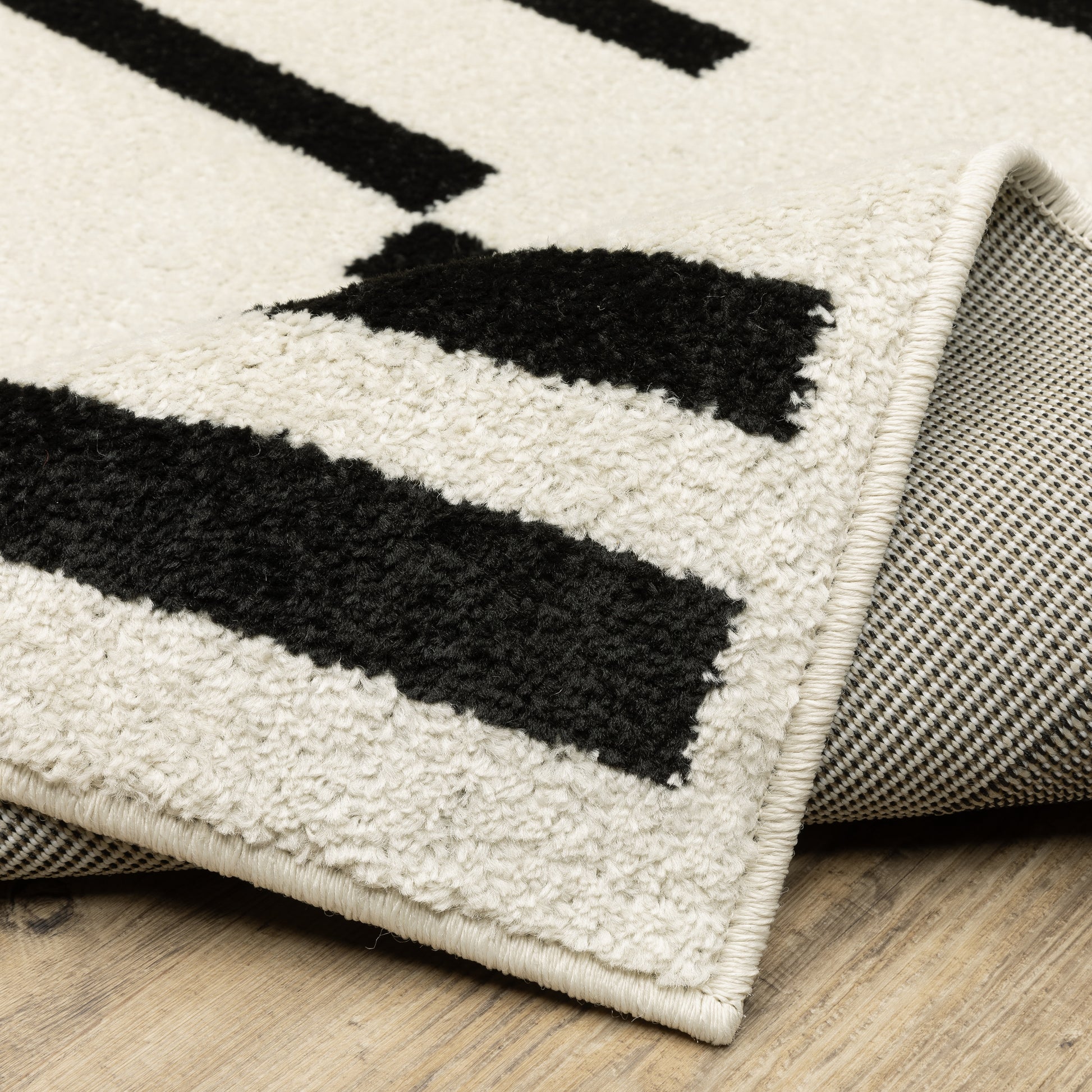 Quinn Stripe Beige/ Black Geometric Cut Pile Rug
