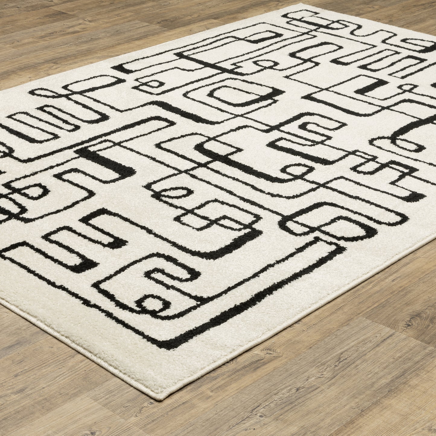 Quinn Abstract Beige/ Black Cut Pile Rug