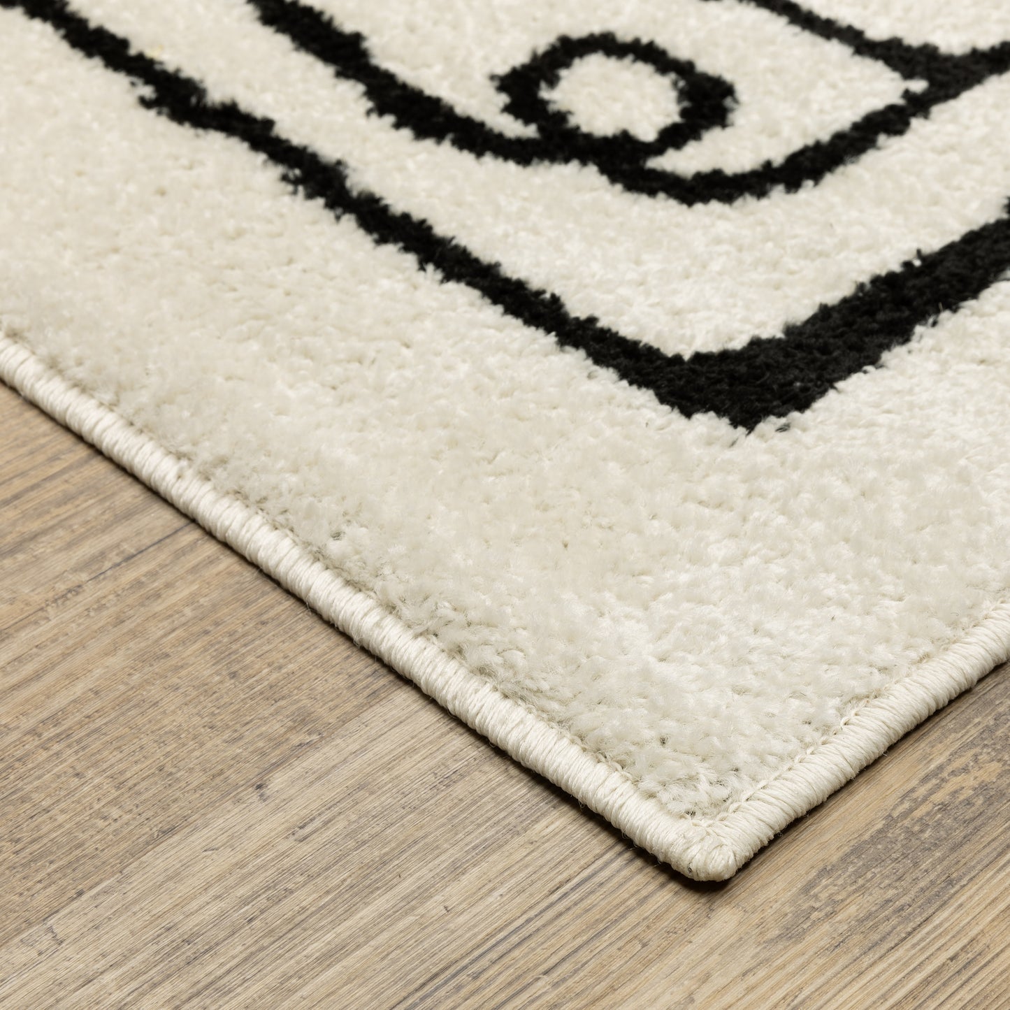 Quinn Abstract Beige/ Black Cut Pile Rug