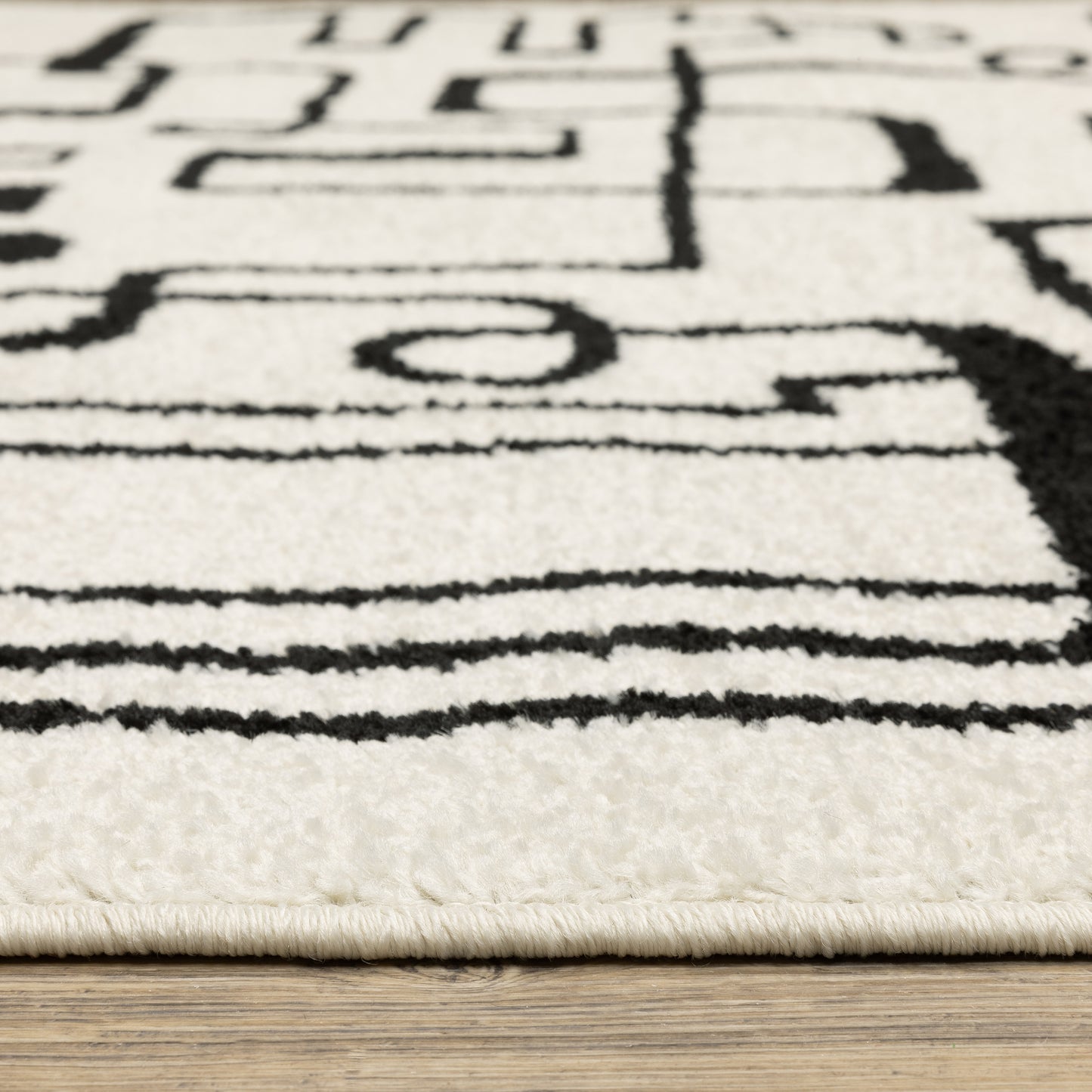 Quinn Abstract Beige/ Black Cut Pile Rug