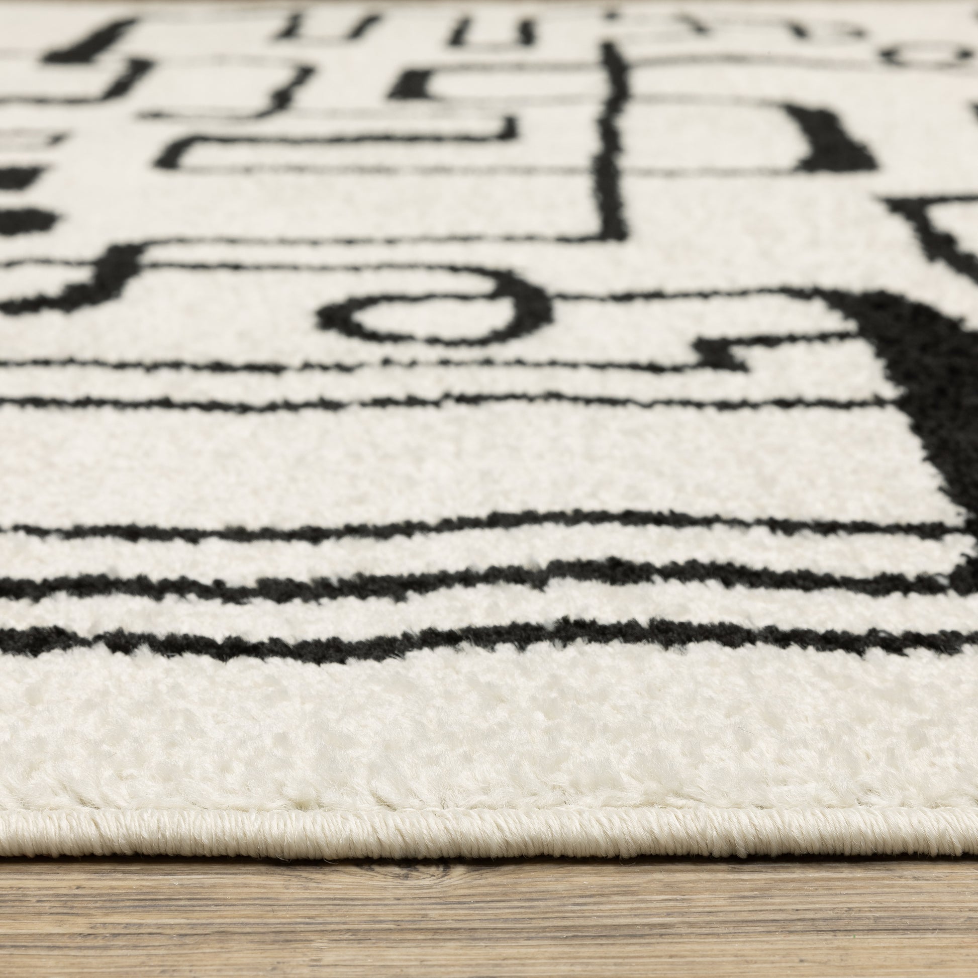 Quinn Abstract Beige/ Black Cut Pile Rug