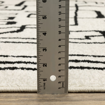 Quinn Abstract Beige/ Black Cut Pile Rug
