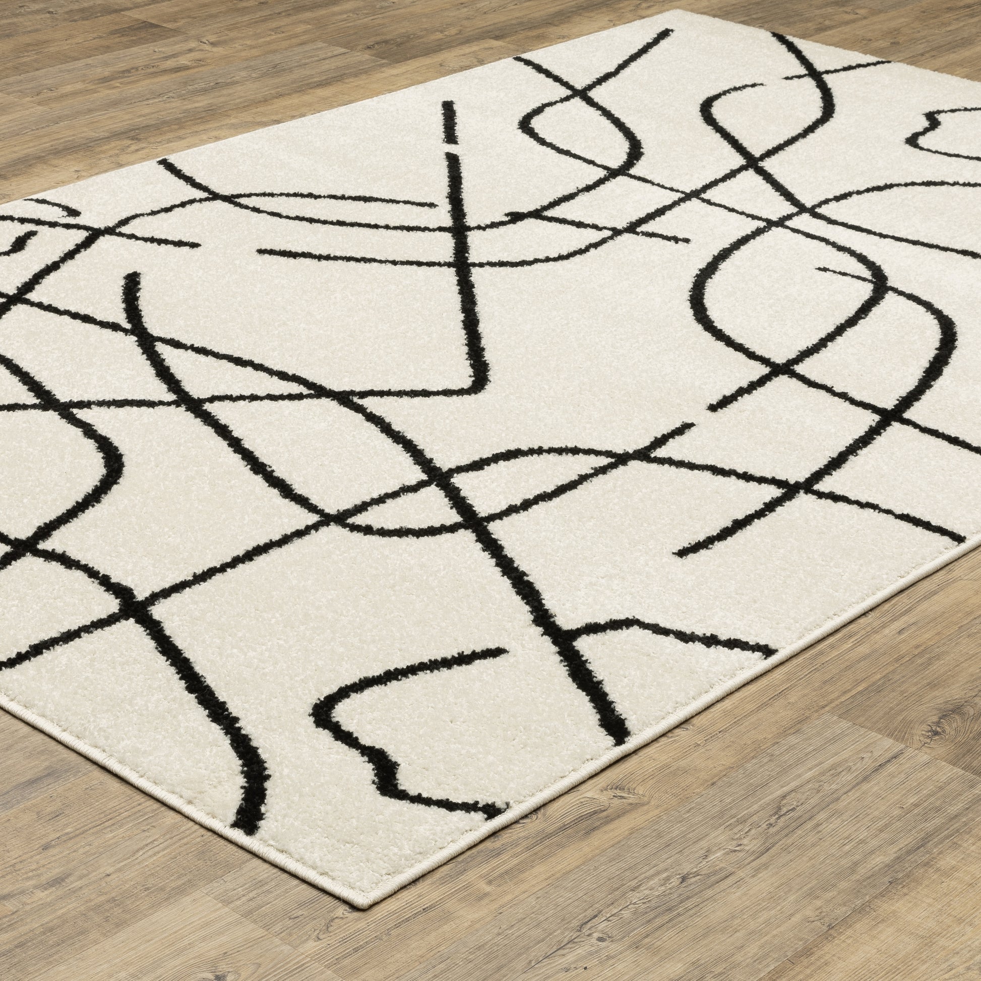Quinn Abstract Beige/ Black Cut Pile Rug