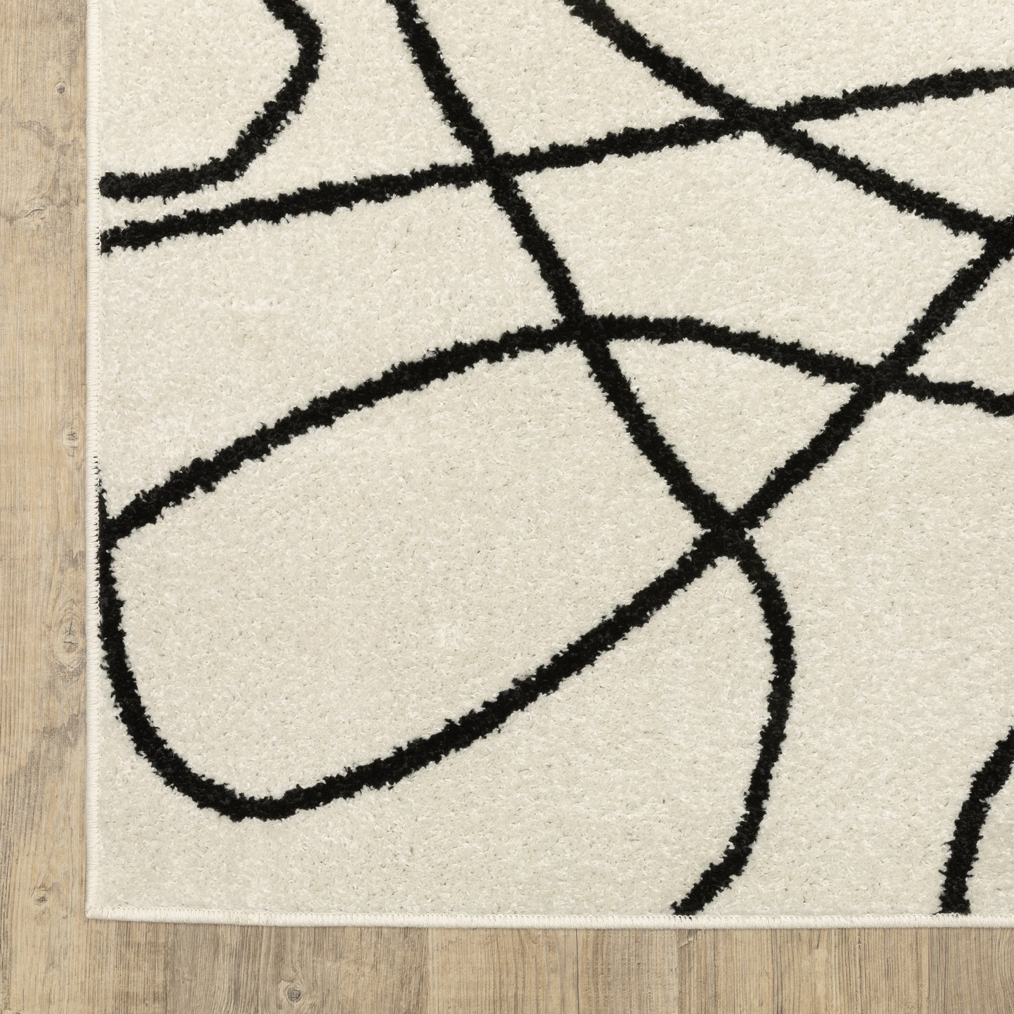 Quinn Abstract Beige/ Black Cut Pile Rug