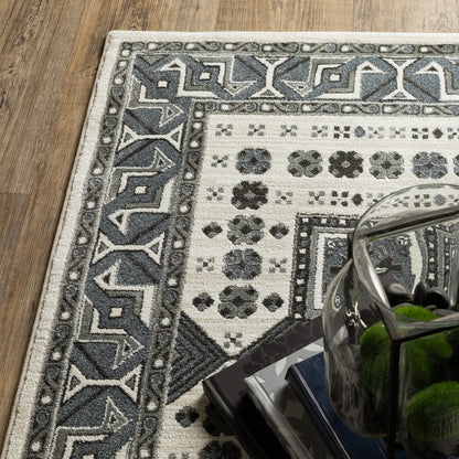 Raylan Oriental Grey/ Blue Geometric Cut Pile Rug