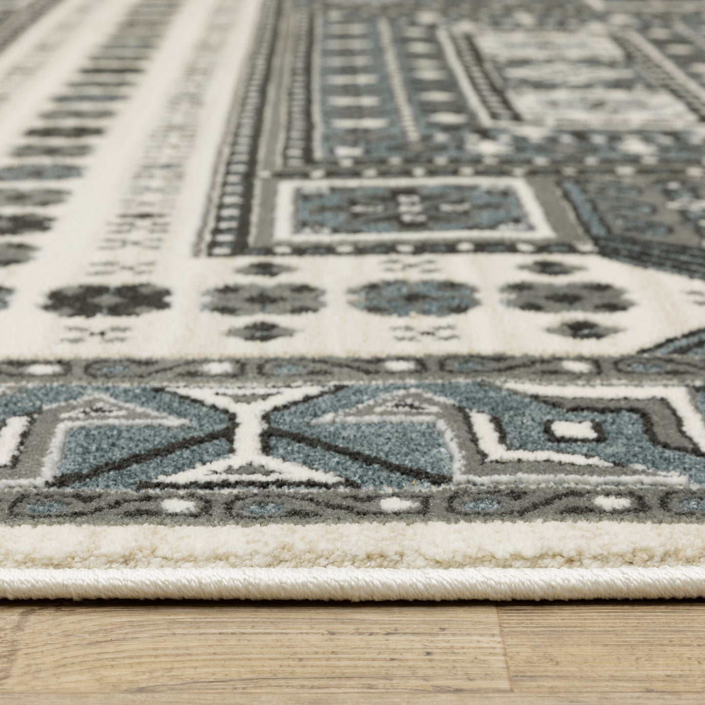 Raylan Oriental Grey/ Blue Geometric Cut Pile Rug