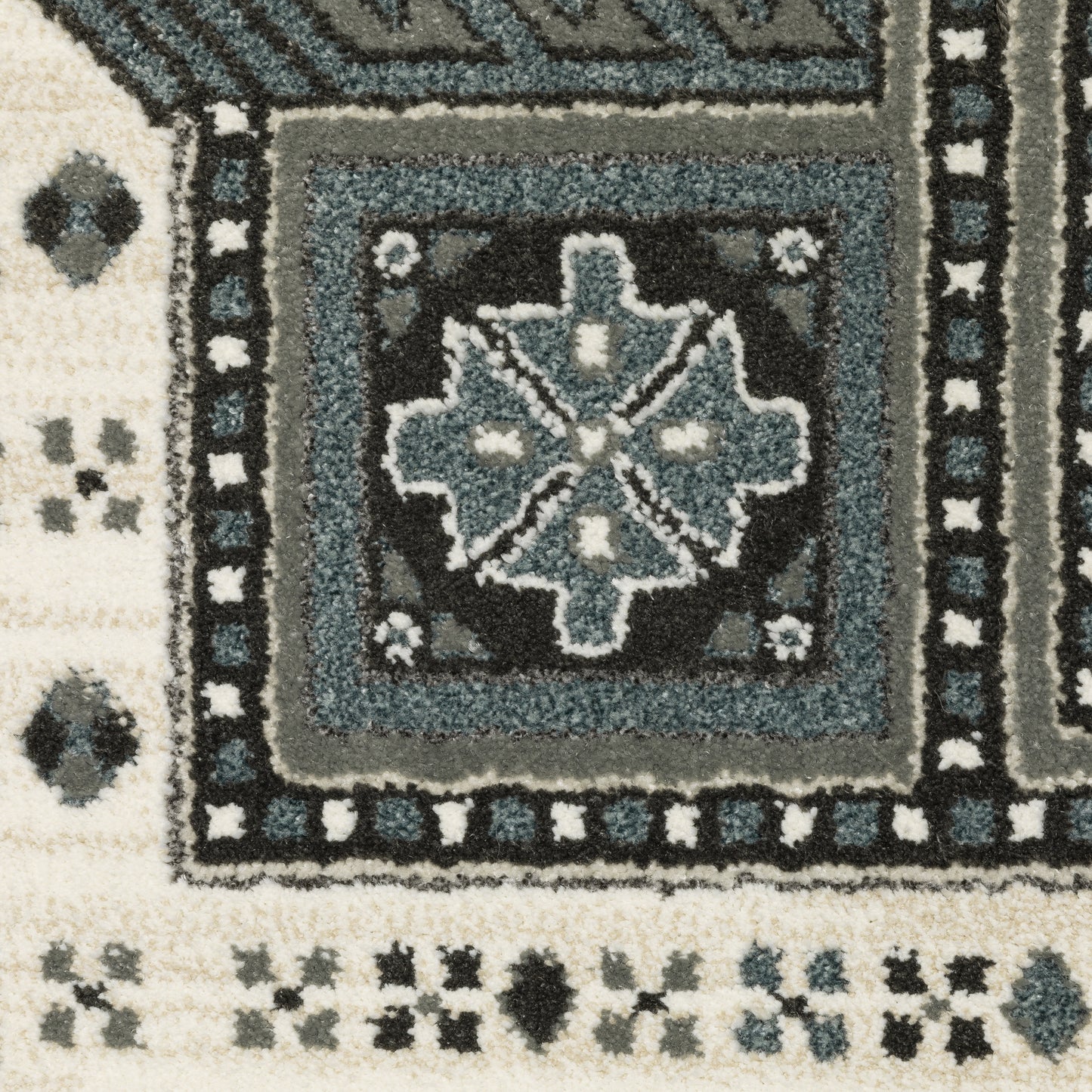 Raylan Oriental Grey/ Blue Geometric Cut Pile Rug