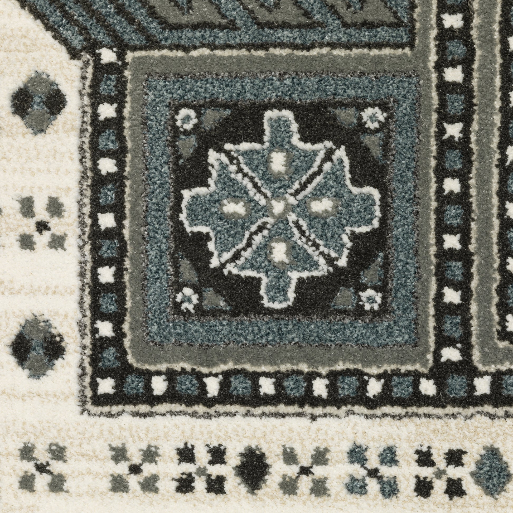 Raylan Oriental Grey/ Blue Geometric Cut Pile Rug