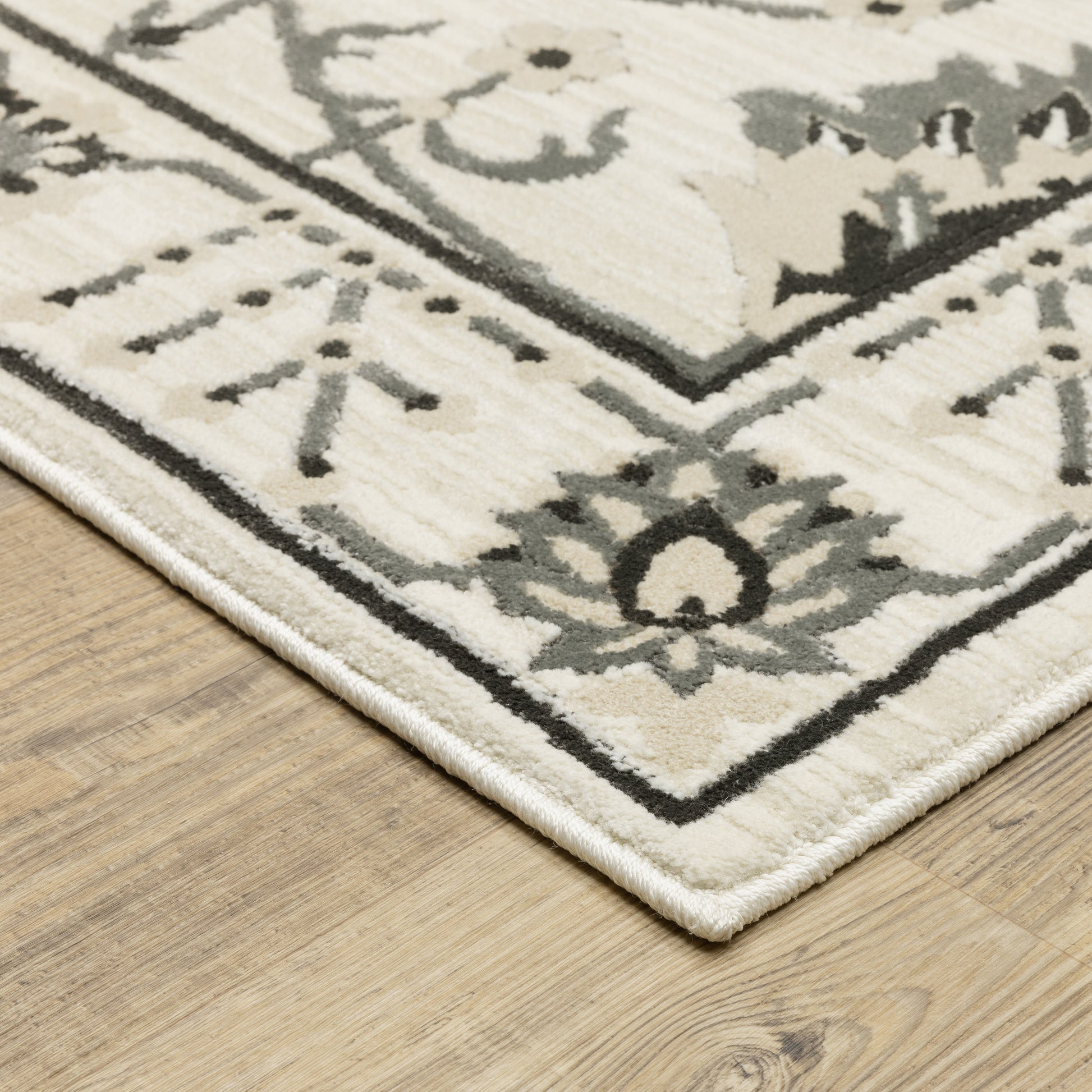Raylan Floral Ivory/ Grey Oriental Cut Pile Rug