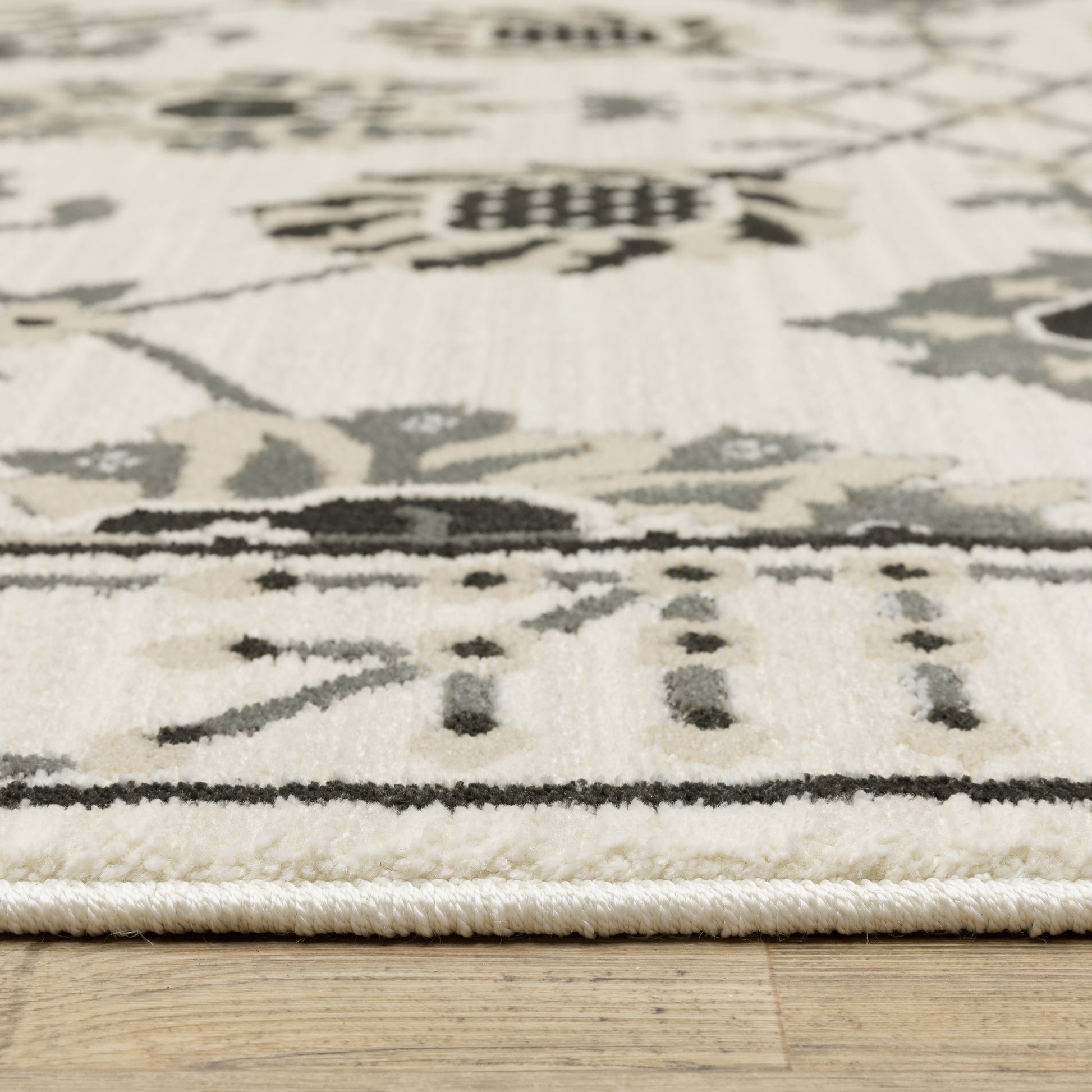 Raylan Floral Ivory/ Grey Oriental Cut Pile Rug