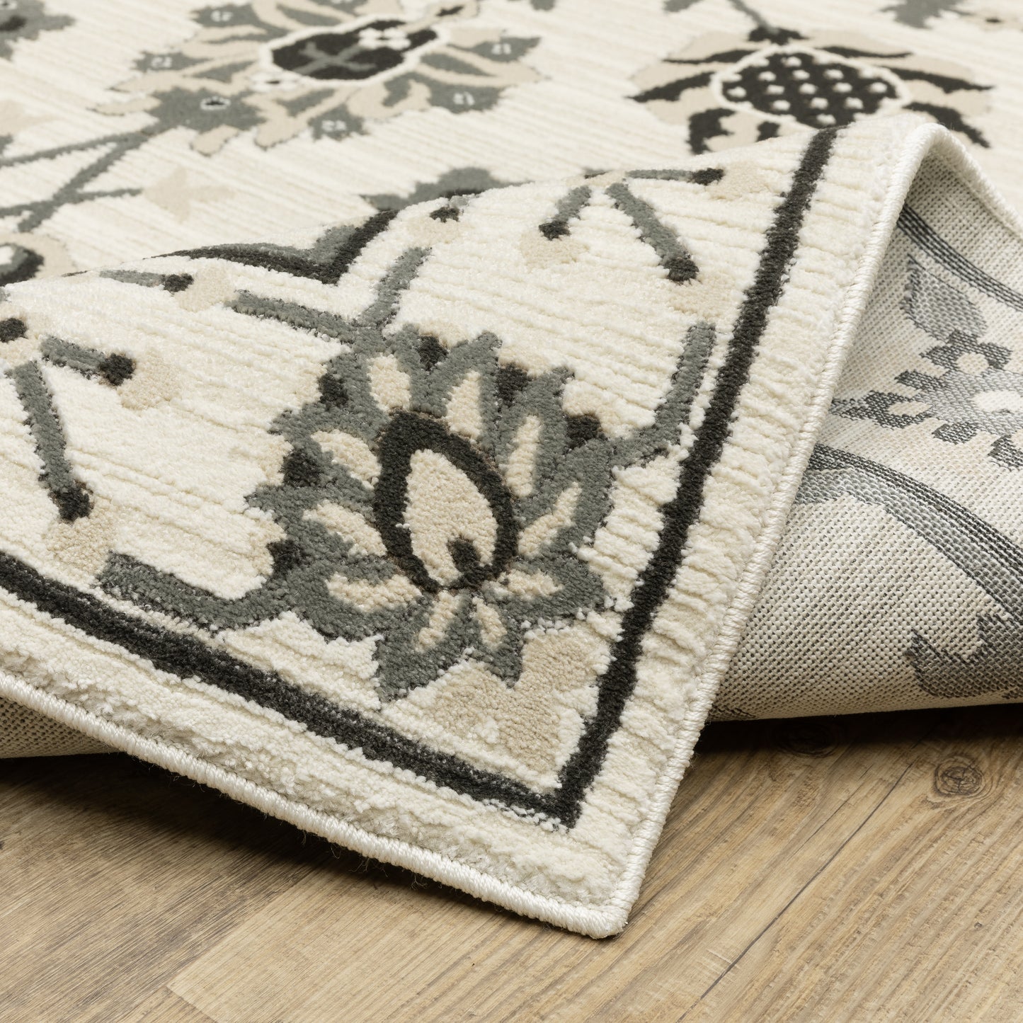Raylan Floral Ivory/ Grey Oriental Cut Pile Rug