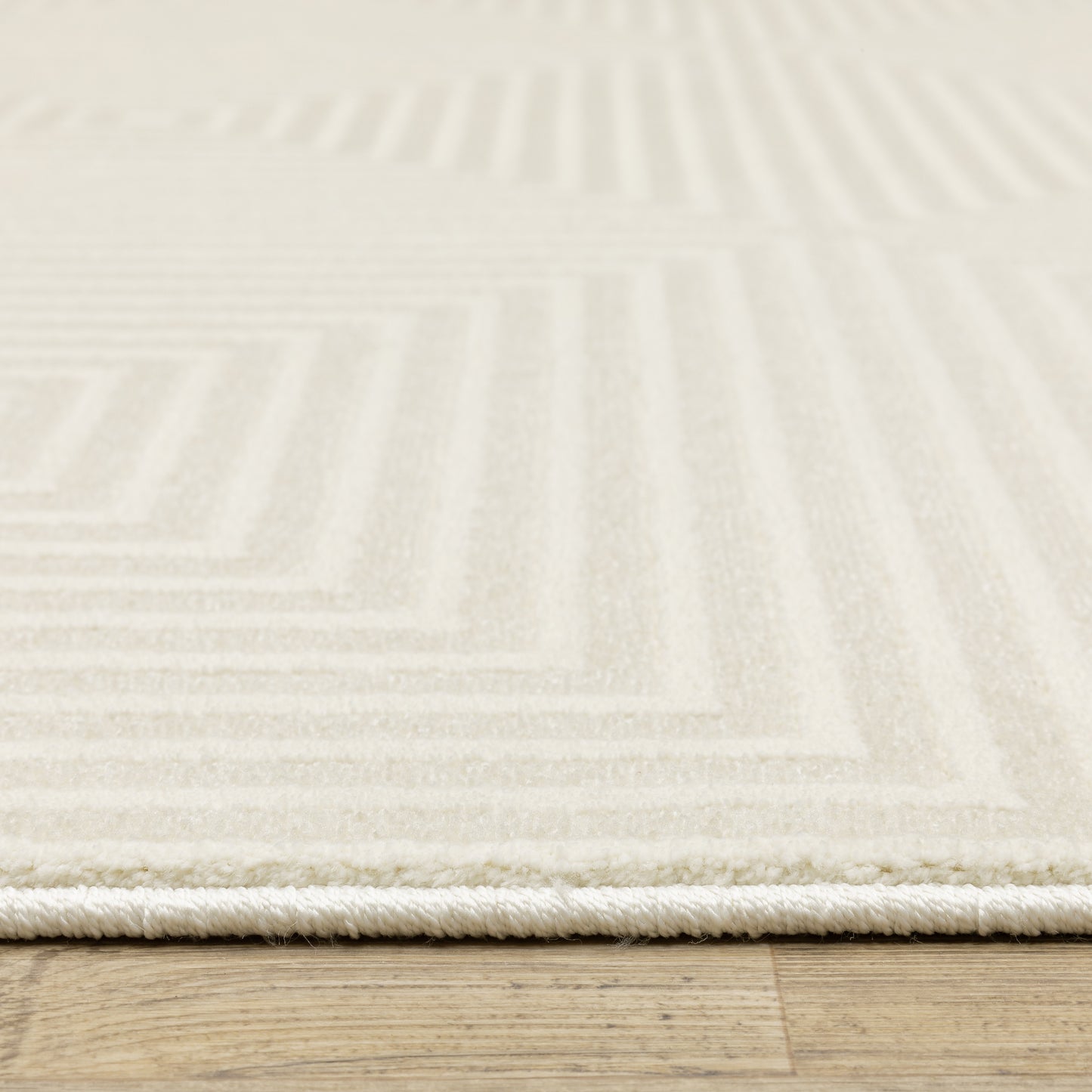 Raylan Geometric Ivory/ Ivory Cut Pile Rug