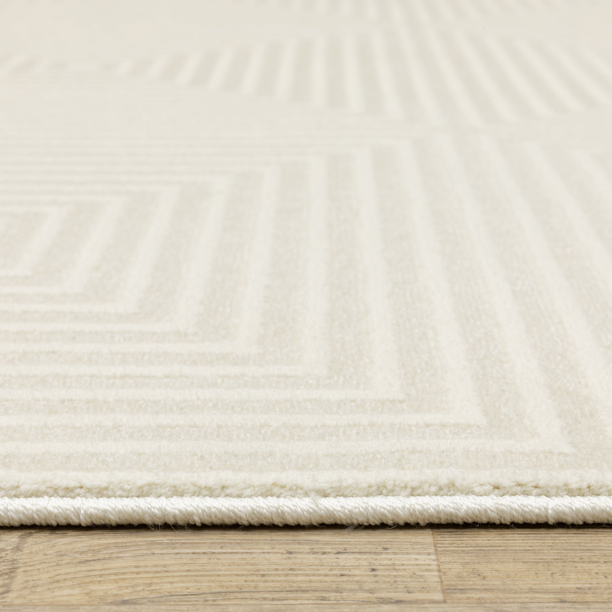Raylan Geometric Ivory/ Ivory Cut Pile Rug