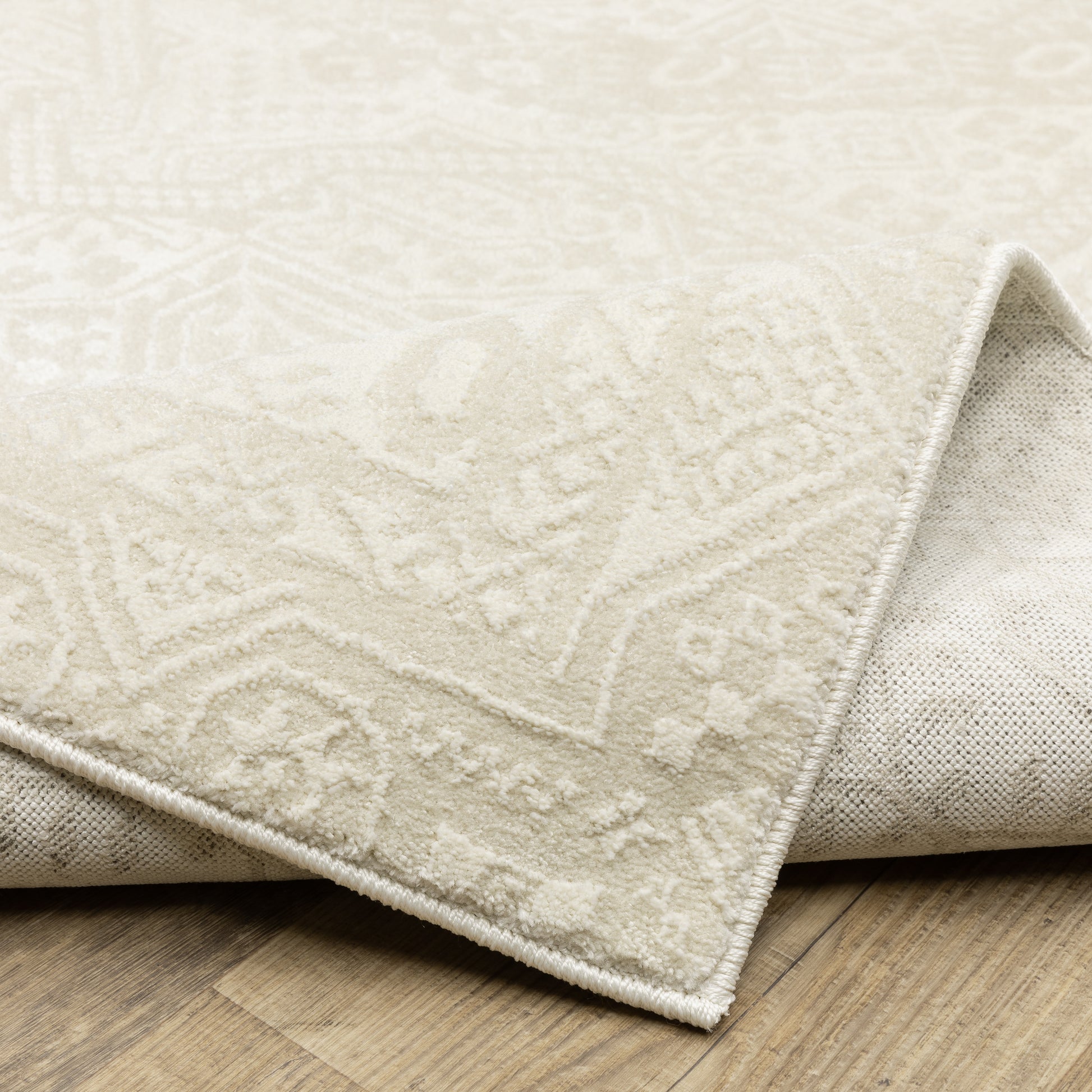 Raylan Medallion Ivory/ Ivory Oriental Cut Pile Rug