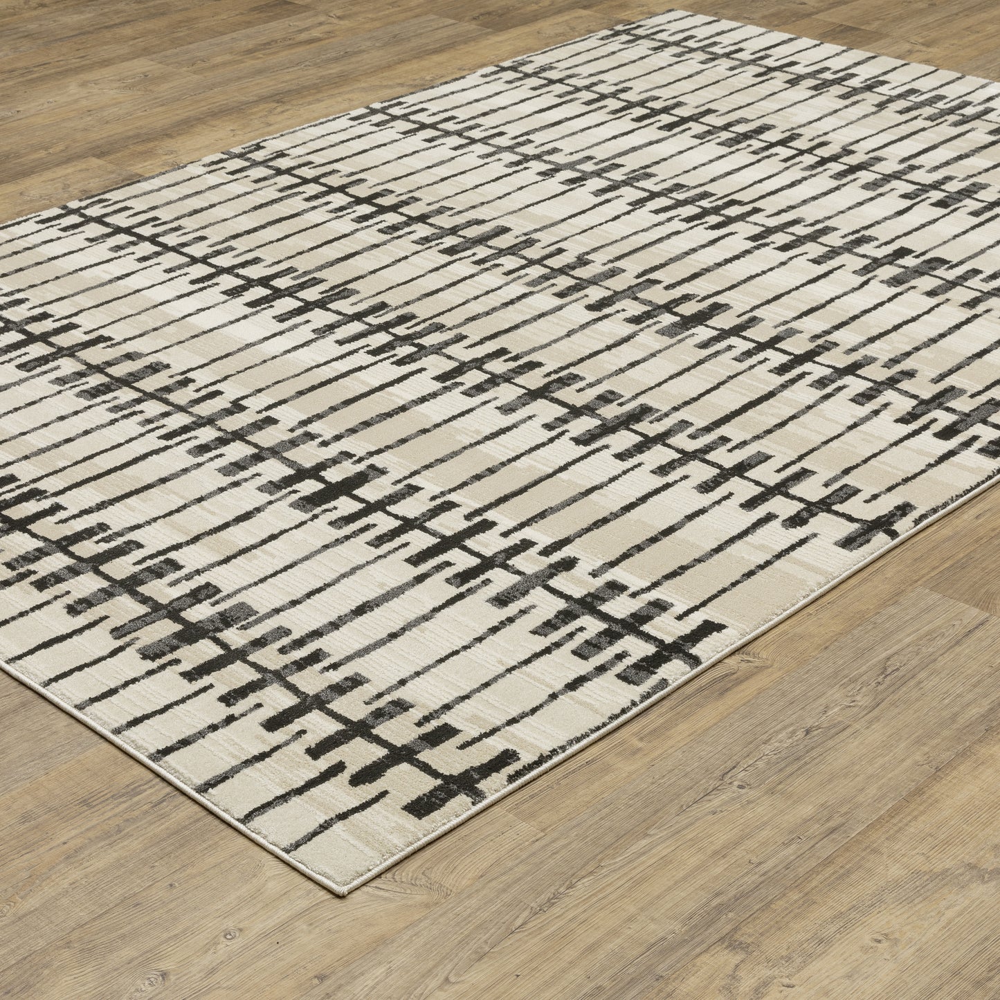 Raylan Abstract Ivory/ Black Geometric Cut Pile Rug