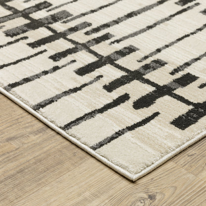 Raylan Abstract Ivory/ Black Geometric Cut Pile Rug