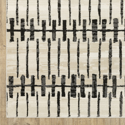 Raylan Abstract Ivory/ Black Geometric Cut Pile Rug
