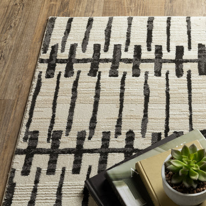 Raylan Abstract Ivory/ Black Geometric Cut Pile Rug