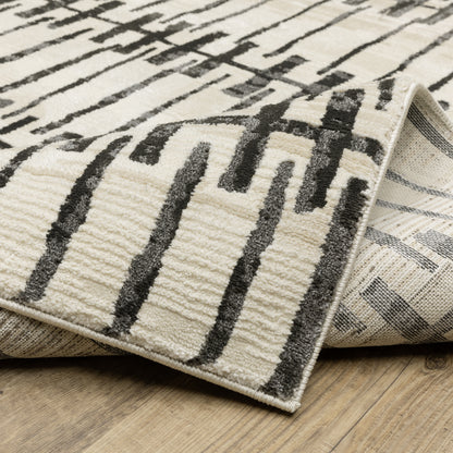 Raylan Abstract Ivory/ Black Geometric Cut Pile Rug