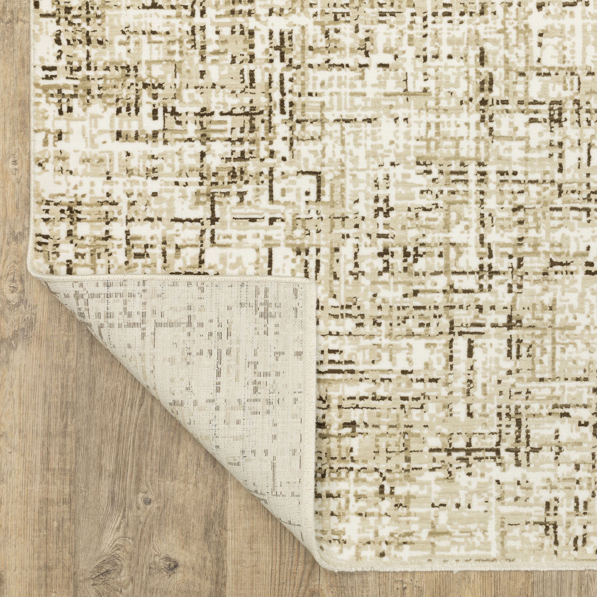 Reed Distressed Ivory/ Brown Abstract Cut Pile Rug