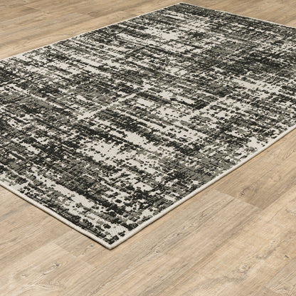 Torrey Outdoor Black/ Beige Distressed Loop Pile Rug