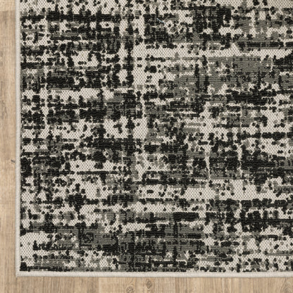 Torrey Outdoor Black/ Beige Distressed Loop Pile Rug