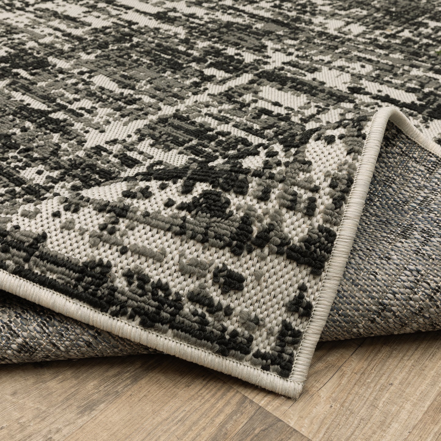 Torrey Outdoor Black/ Beige Distressed Loop Pile Rug