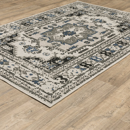 Torrey Outdoor Beige/ Grey Distressed Loop Pile Rug