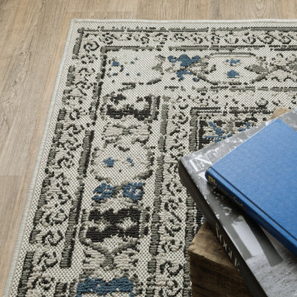 Torrey Outdoor Beige/ Grey Distressed Loop Pile Rug