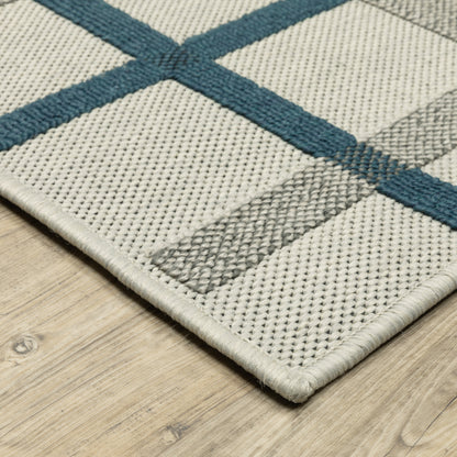 Torrey Outdoor Beige/ Blue Geometric Loop Pile Rug