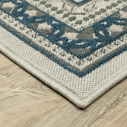 Torrey Outdoor Beige/ Blue Border Loop Pile Rug