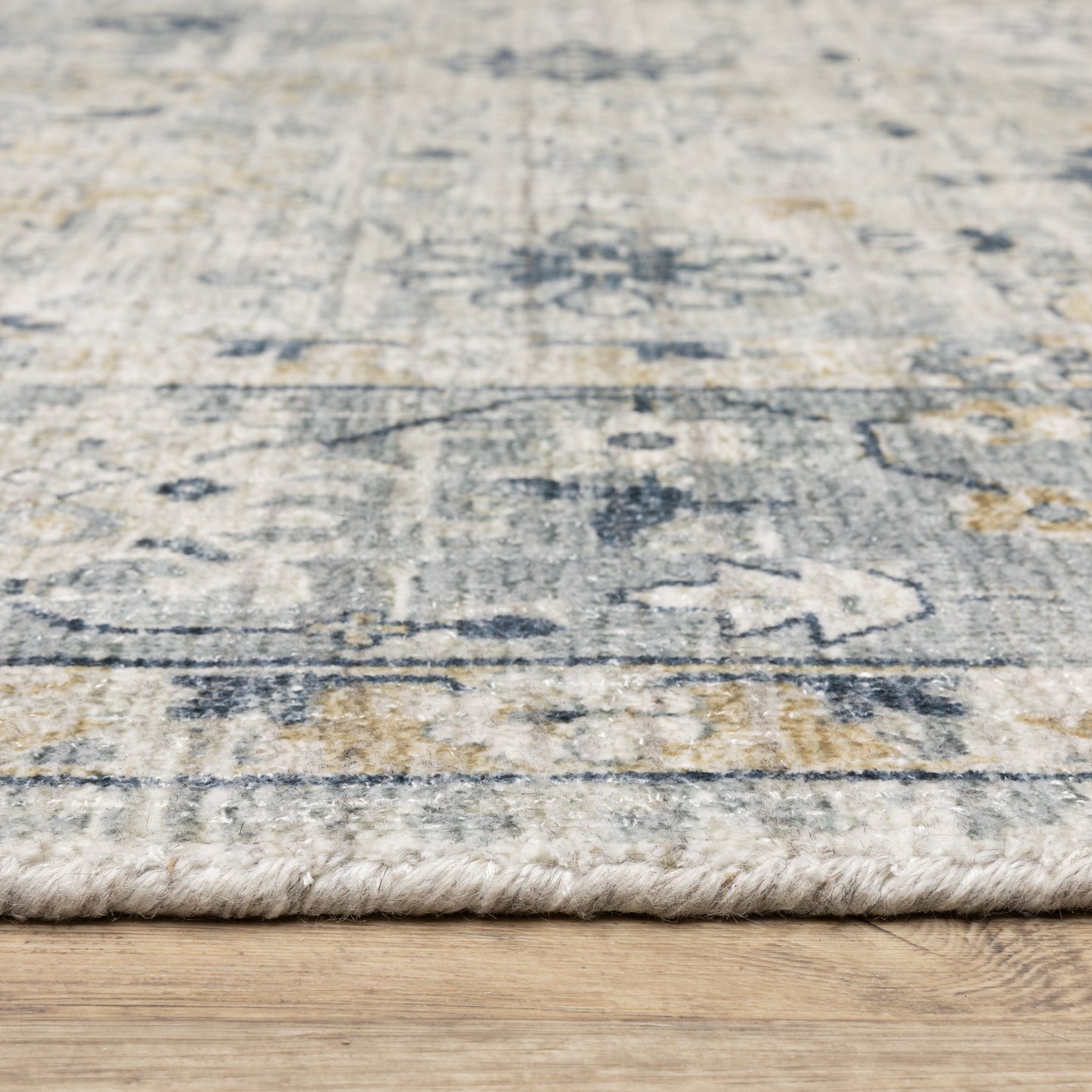 Windham Floral Ivory/ Blue Distressed Cut Pile Rug