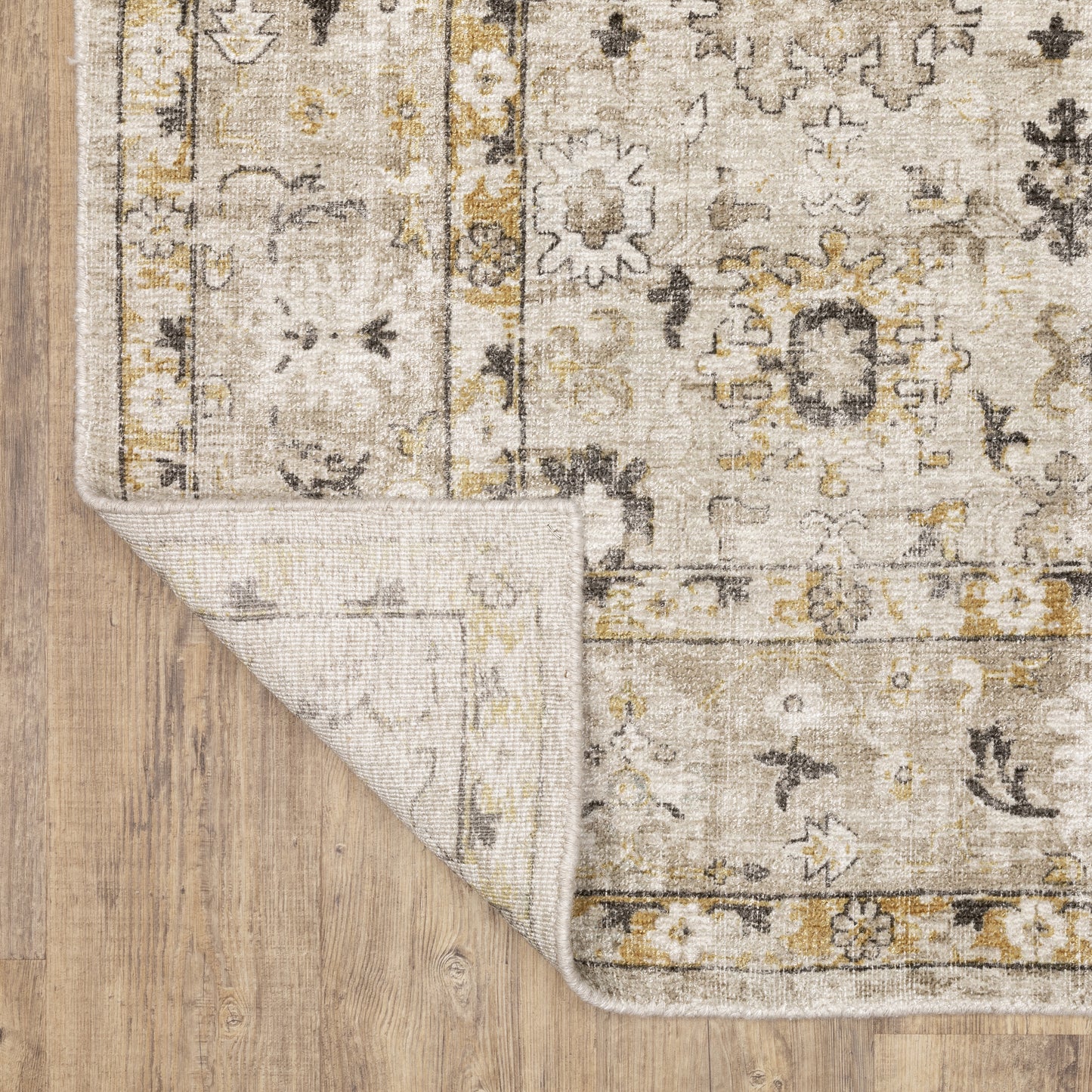 Windham Floral Beige/ Gold Distressed Cut Pile Rug
