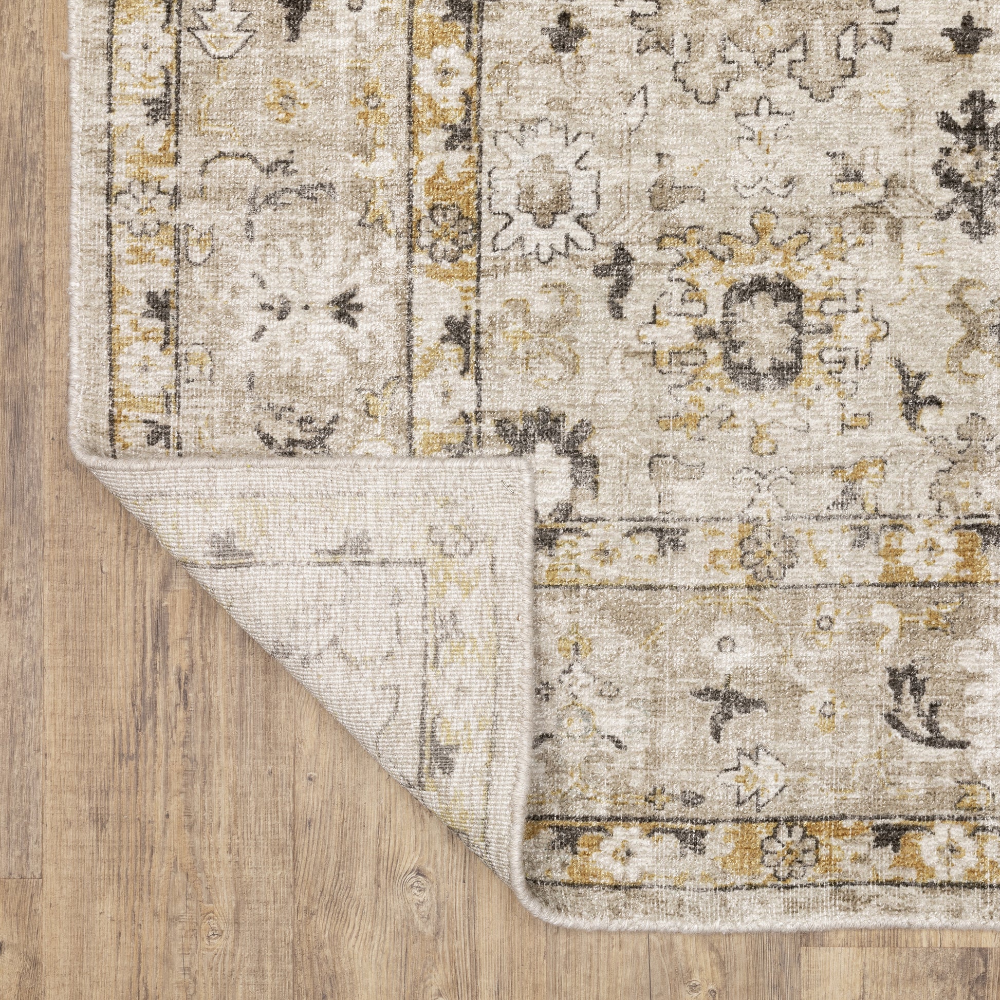 Windham Floral Beige/ Gold Distressed Cut Pile Rug